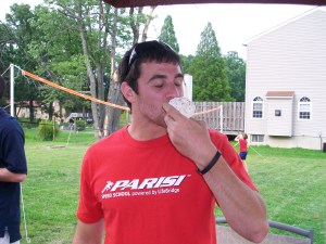 Josh on 4th of July enjoying the giant Rice Crispy Treat we made him